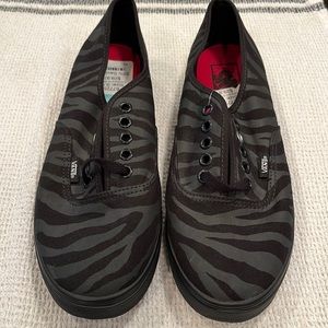 Women’s Low Top Vans- NWT. Black and grey Zebra Print. Size 9.5